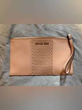 Michael Kors Jet Set Travel Flat Studded Wristlet in Soft Pink.